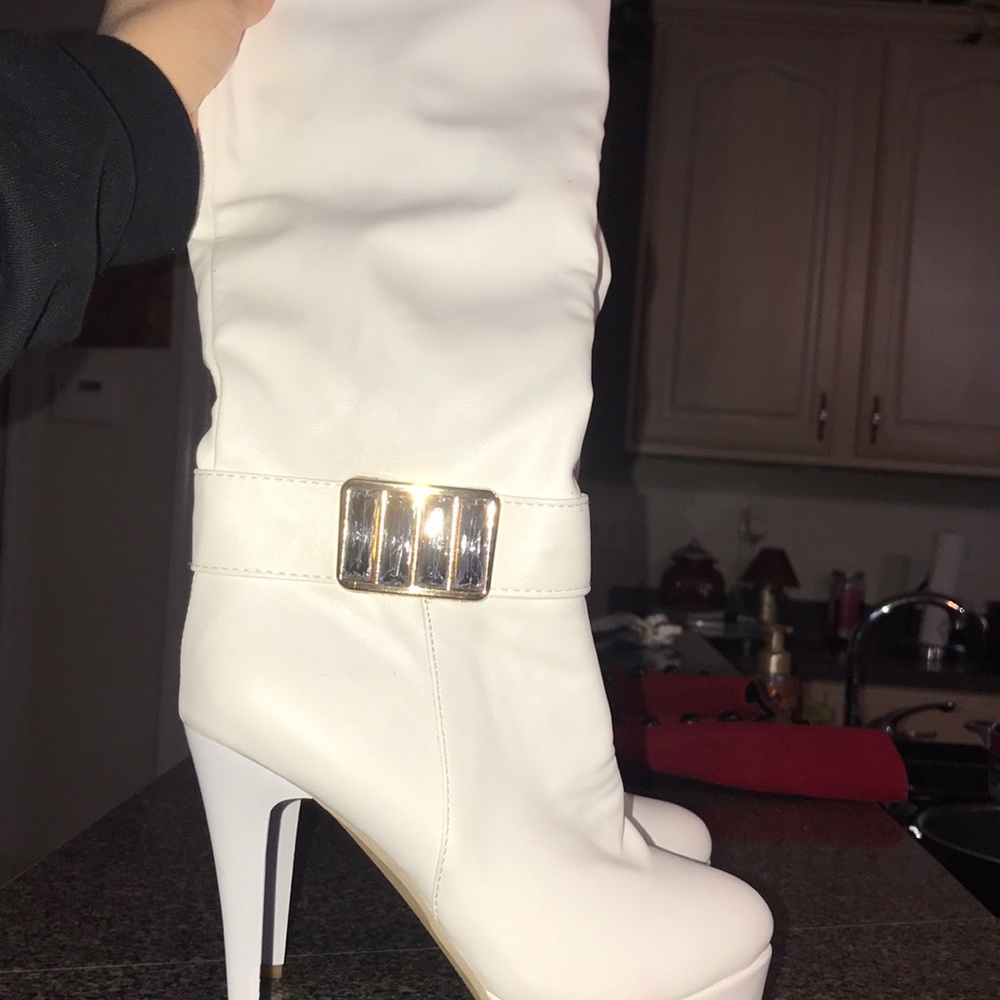 White heeled boots